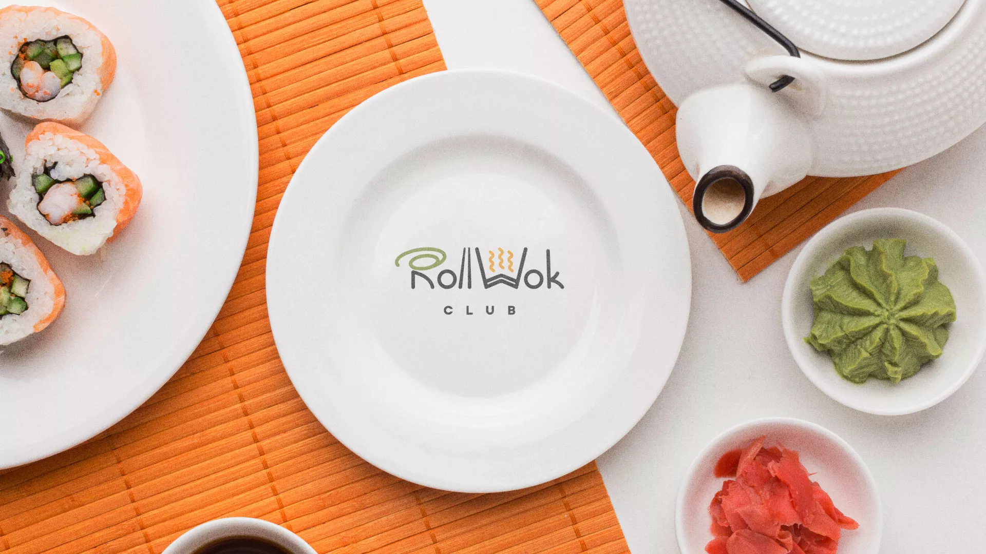 Разработка логотипа и фирменного стиля в Гурьевске для суши-бара «Roll Wok Club» Разработка логотипа и фирменного стиля в Гурьевске для суши-бара «Roll Wok Club»